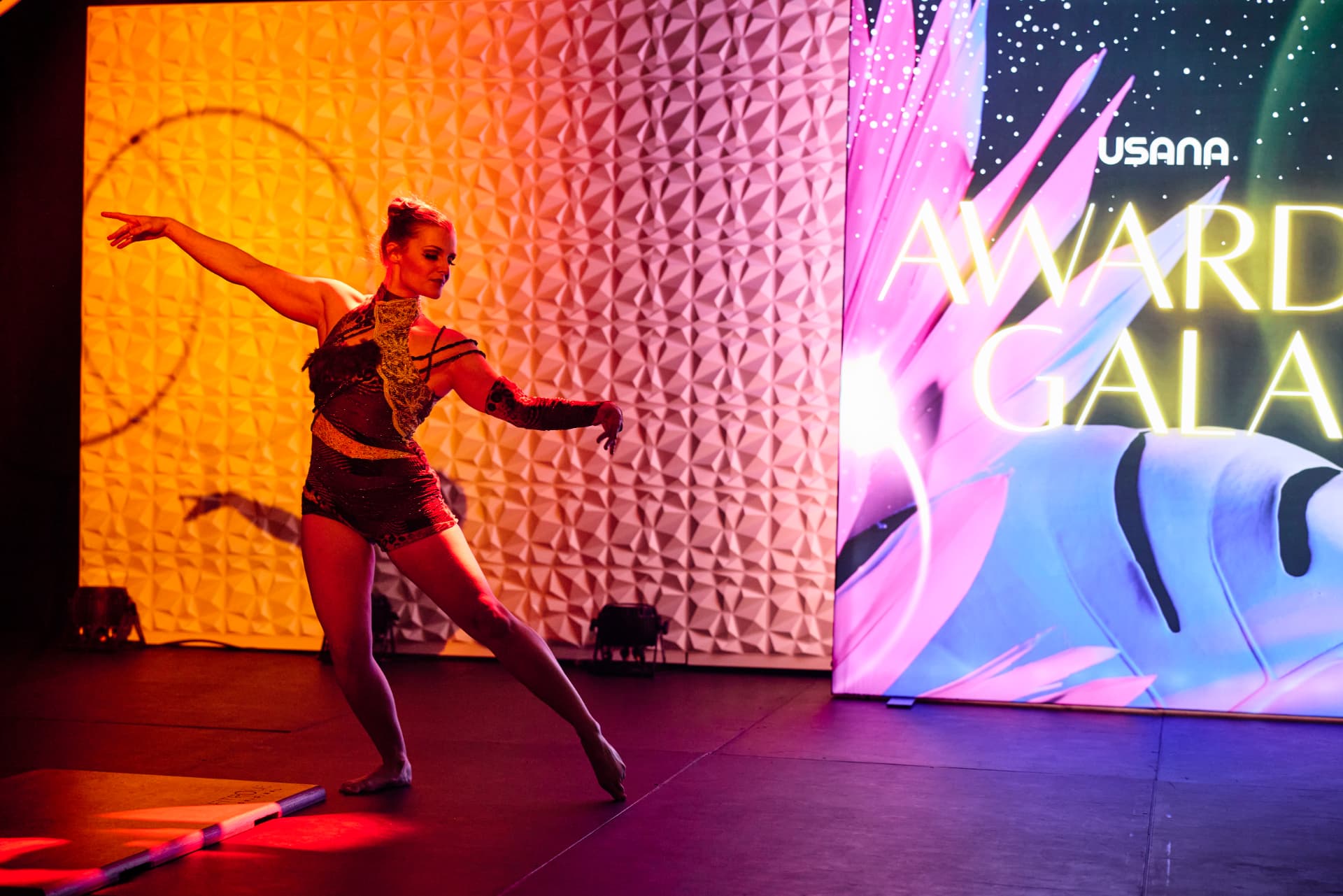 Circus performer dancing on stage