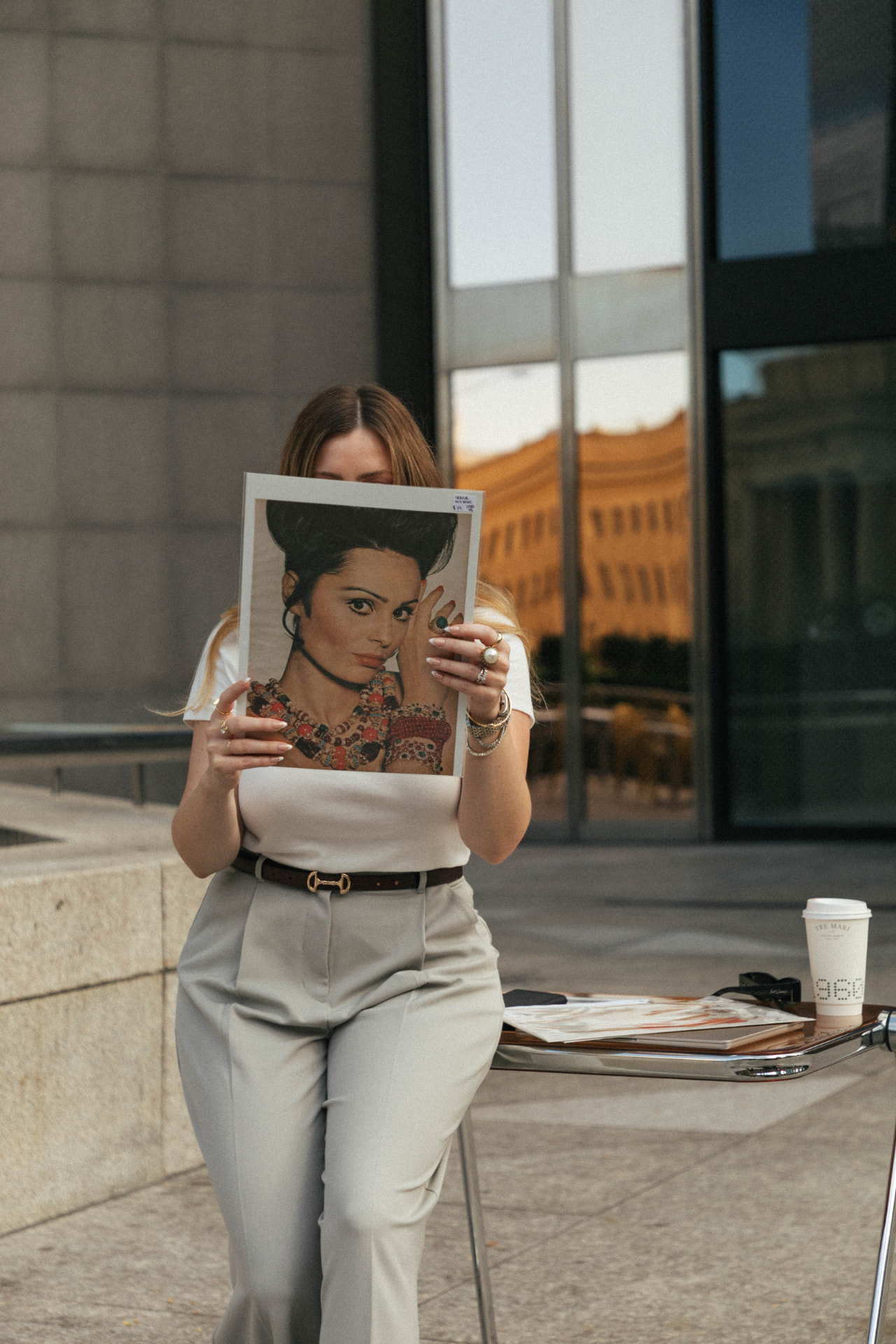 Sabina Bozzo holding a vintage fashion magazine